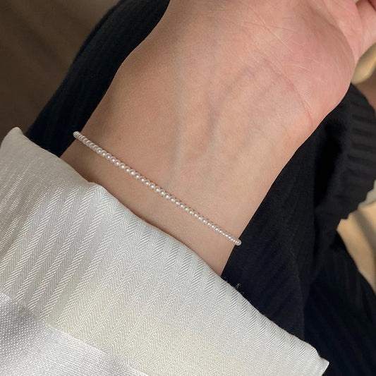 Pulsera de mini perlas raras de 2 mm